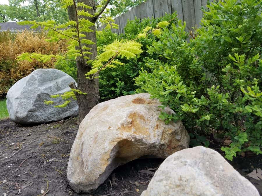 Using Boulders in the Landscape Sweeney's Custom Landscaping Inc